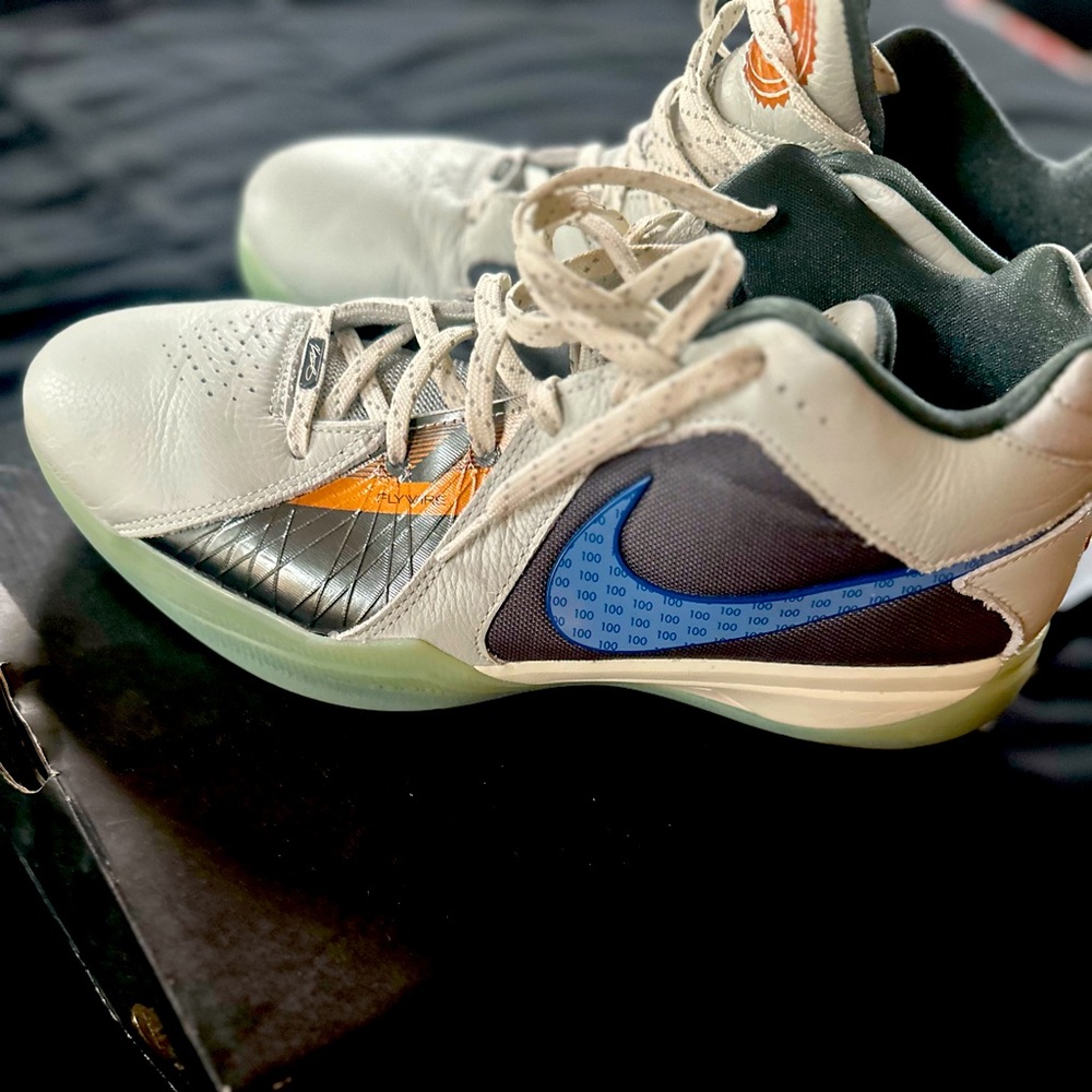 Nike Athletic Shoes in White, Orange, and Blue